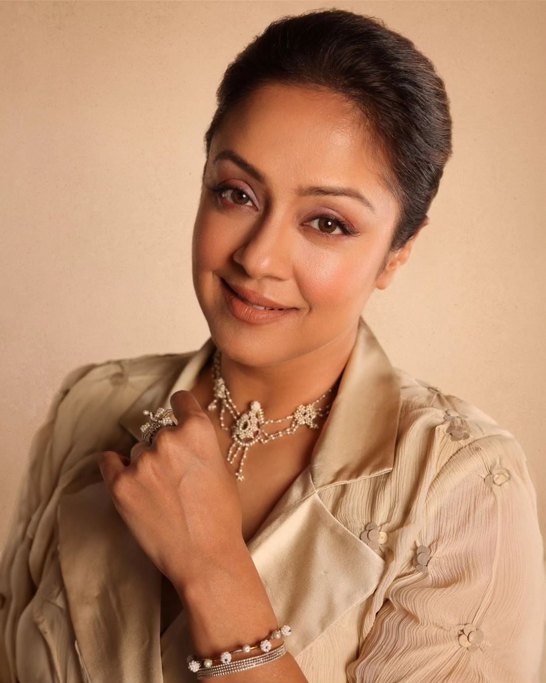 Tamil Actress Jyothika Stills In Grey Color Dress